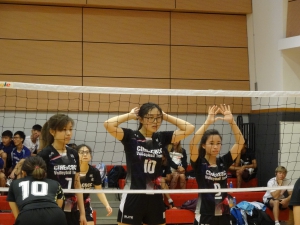 Nora Lai, Winsy Choi, and Ceci Chung of CIHE & CBCC were approaching for a triple block when playing against The Chinese University of Hong Kong.