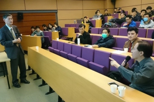 Speakers discussing with audience members during the seminars