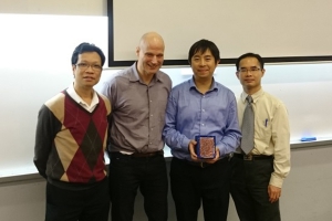 Prof C. K. Poon and Dr Jeff Tang presenting souvenirs to Prof Michael Cohen and Dr Benson Lam after their presentations in February 2016